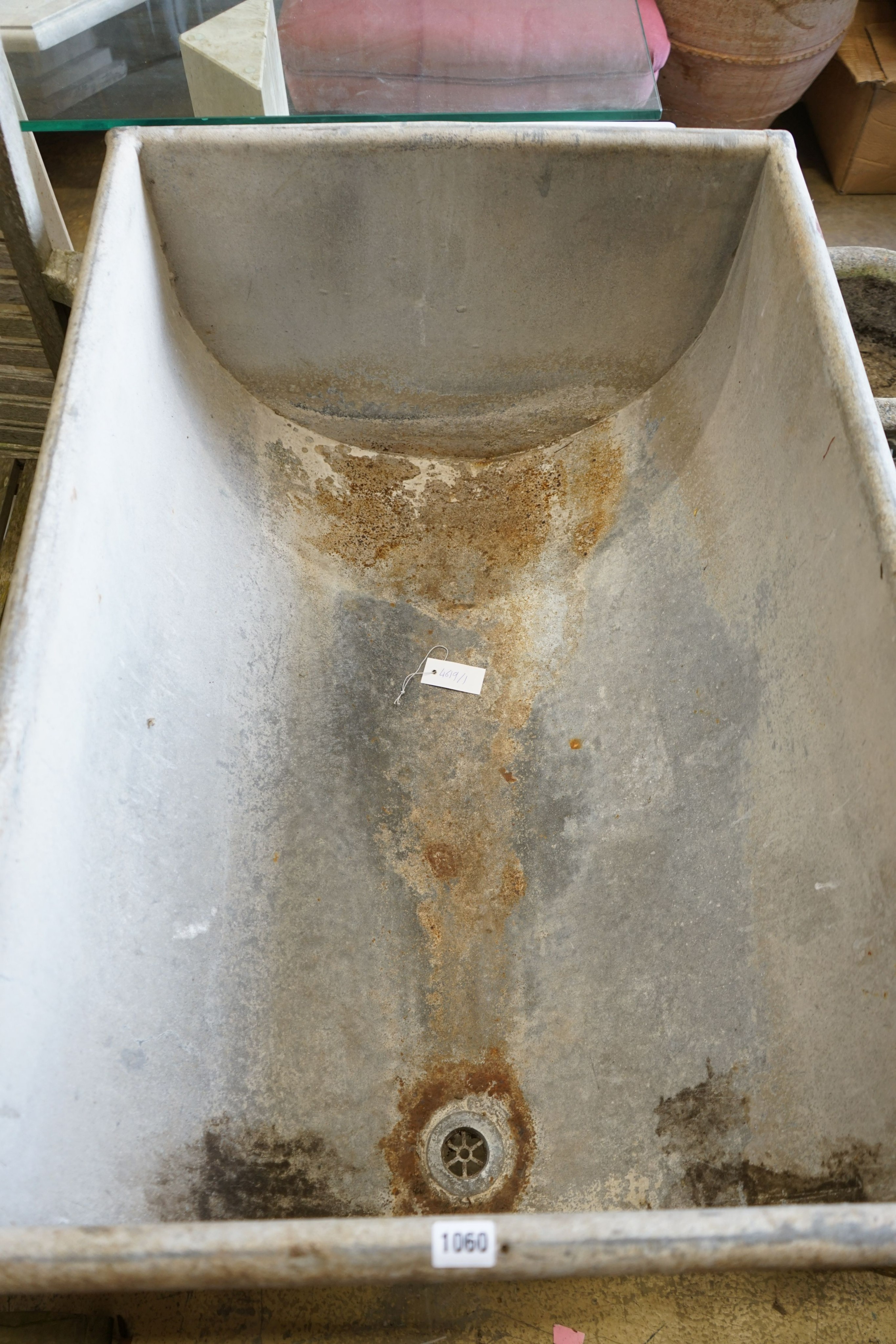 A rectangular galvanised metal water trough, length 97cm, depth 66cm, height 77cm